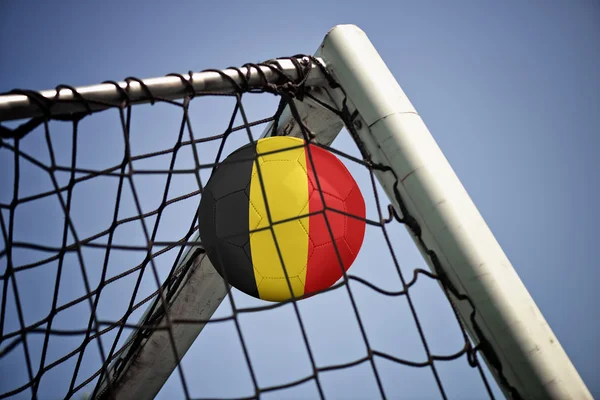 Soccerball in net with the flag of Belgium — Stock Photo, Image