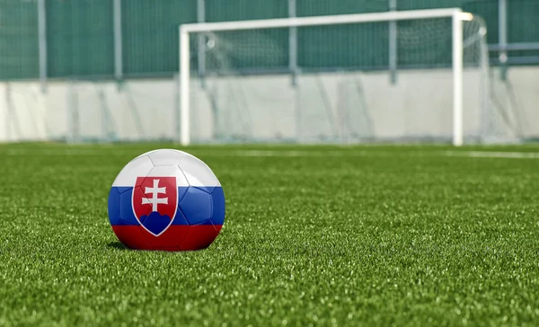 Soccer ball on the green field- flag Slovakia — Stock Photo, Image