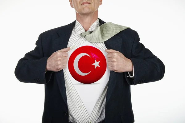 Superhero pulling Open Shirt with soccer ball - Turkey — Stock Photo, Image