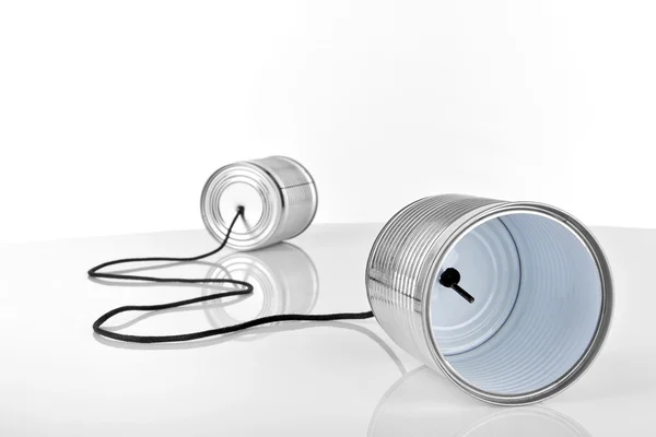 Cans connected by string — Stock Photo, Image