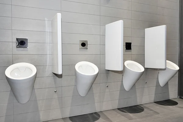 Urinals in row — Stock Photo, Image