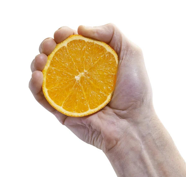 Hallf fresca naranja agarre por mano masculina — Foto de Stock