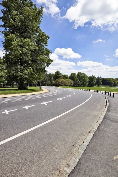 Winding, Curving Road and symbol of death — Stock Photo, Image