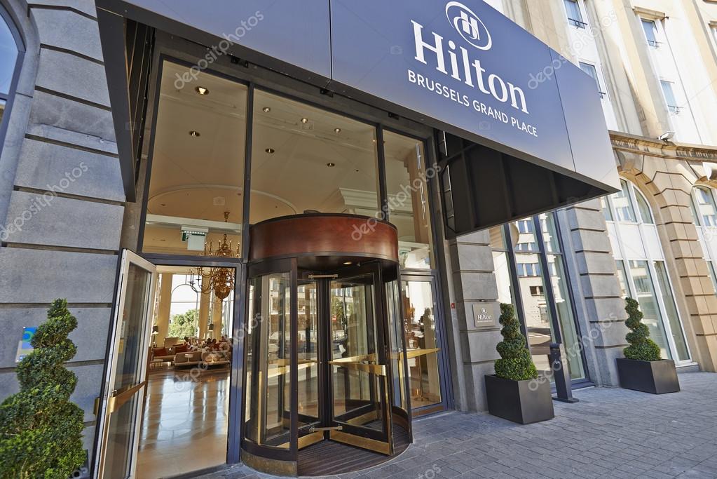 BRUSSELS,BELGIUM - 29 AUGUST 2015: The main entrance and the Glass revolving door at Hotel Hilton Grand Place in Brussels on 29 August 2015