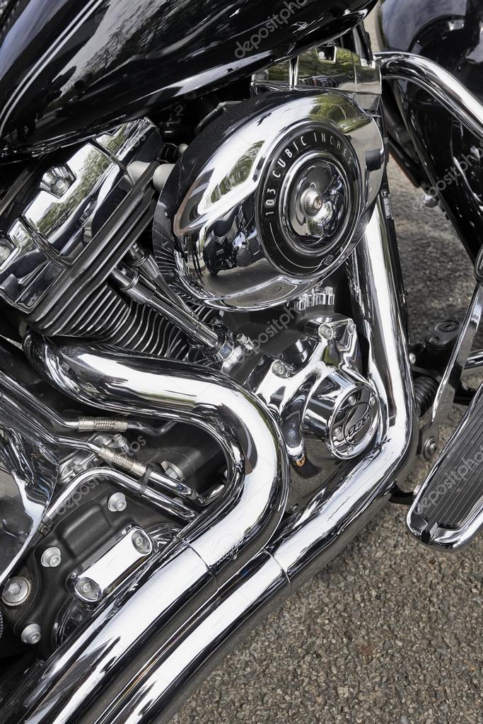 BRUSSELS, BELGIUM - MAY 01, 2015 Custom Harley Davidson motorcycle engine with  Harley logos. Harley Davidson motorcycles continue to be the most popular and coveted motorcycles for customizing throughout the world.