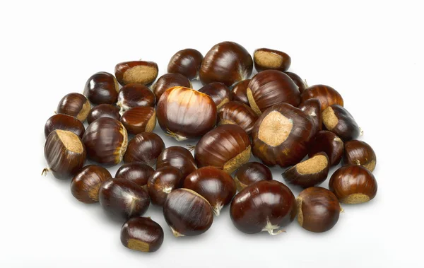 Fresh chestnuts over white — Stock Photo, Image
