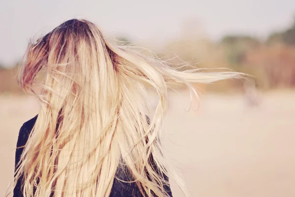 woman with long hairs in motion