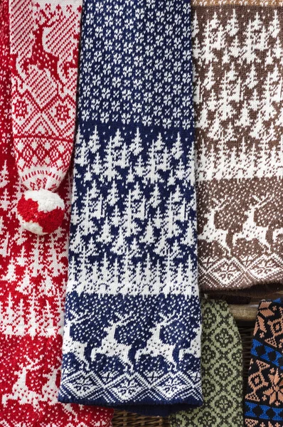 Traditional christmas knitted scarfs — Stock Photo, Image