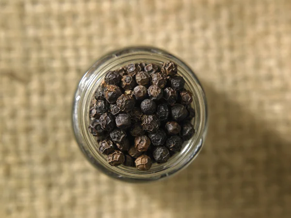 Whole black peppercorns — Stock Photo, Image