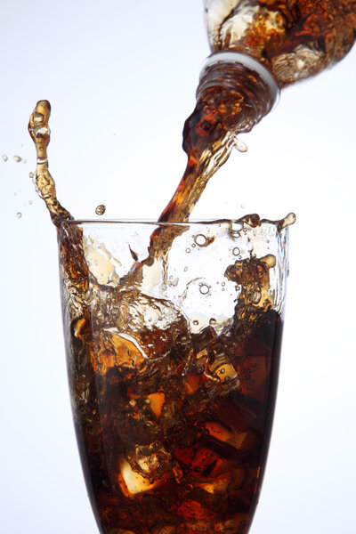 Pouring cola drink