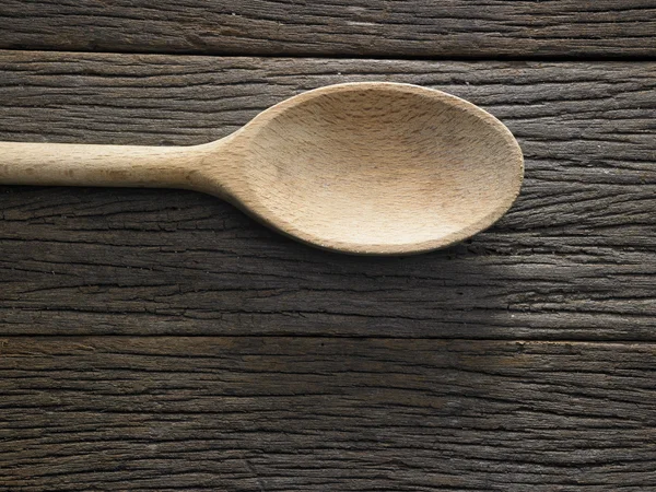 Wooden textured spoon — Stock Photo, Image