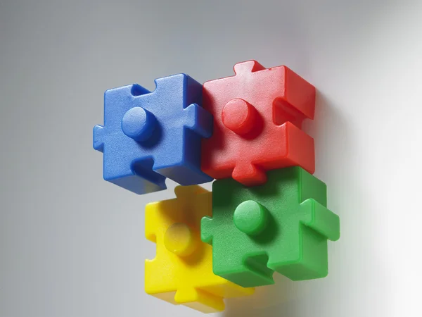 Blocos de quebra-cabeça coloridos — Fotografia de Stock
