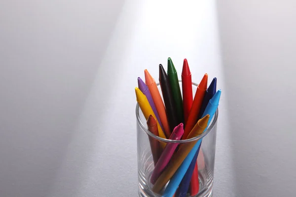 Crayons in transparent glass — Stock Photo, Image