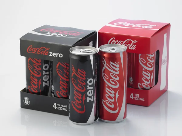 Coca cola cans in boxes — Stock Photo, Image