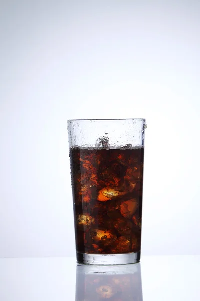 Cola drink in a glass — стоковое фото