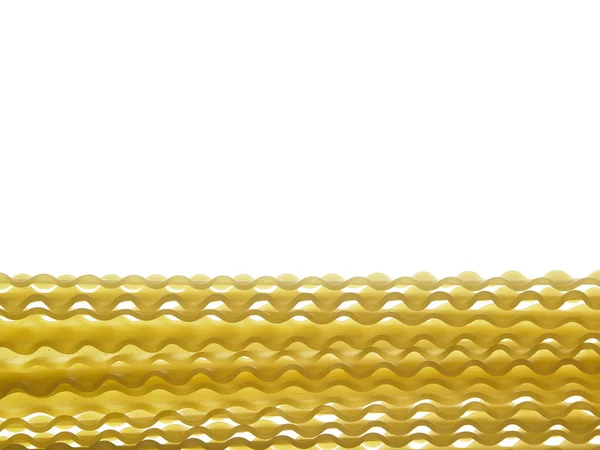 Rå pasta på vit — Stockfoto