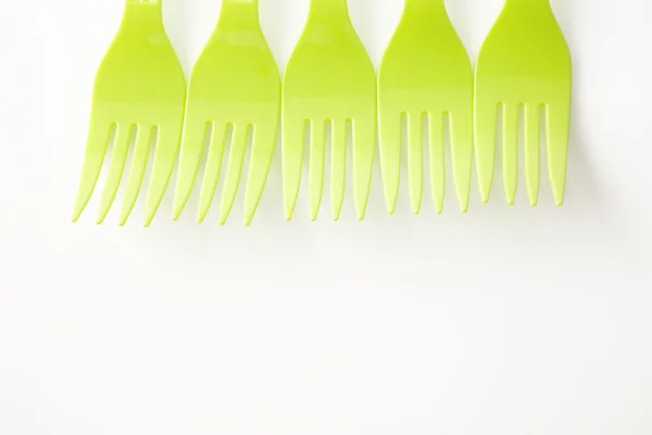 Barevné plastové vidličky — Stock fotografie
