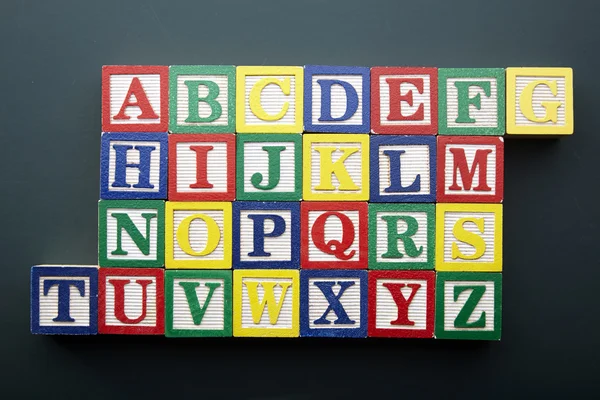 Alfabeto quadrado blocos de madeira — Fotografia de Stock