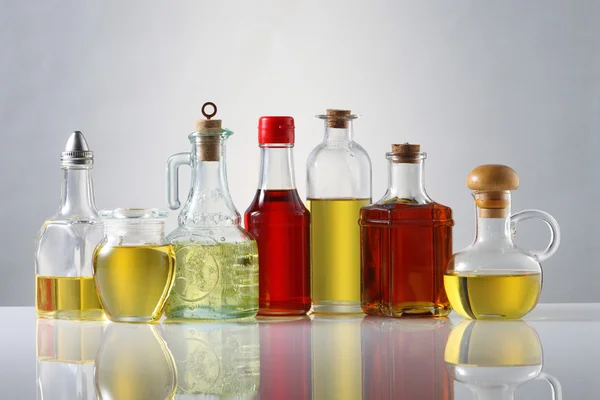 Assortment of oil in bottles Stock Picture