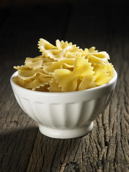 Dry pasta on table — Stock Photo, Image