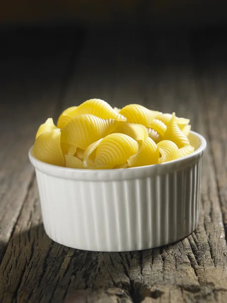 Dry pasta on table — Stock Photo, Image