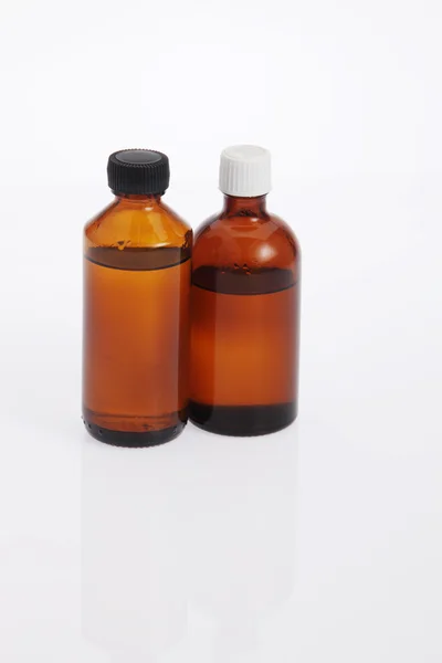 Essential oil in bottles — Stock Photo, Image