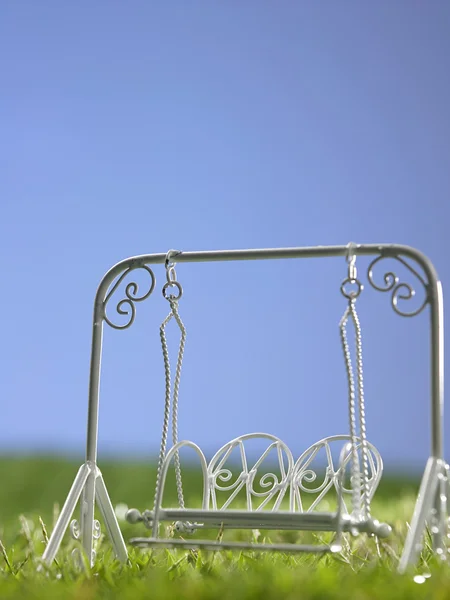 Mini swing on the grass — Stock Photo, Image