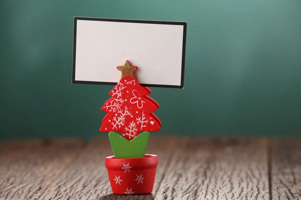 Blank card on christmas tree — Stock Photo, Image