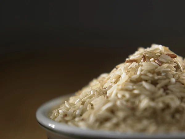 Brown rice on plate — Stock Photo, Image