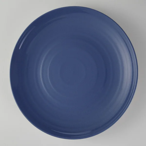 Ein blauer Teller — Stockfoto