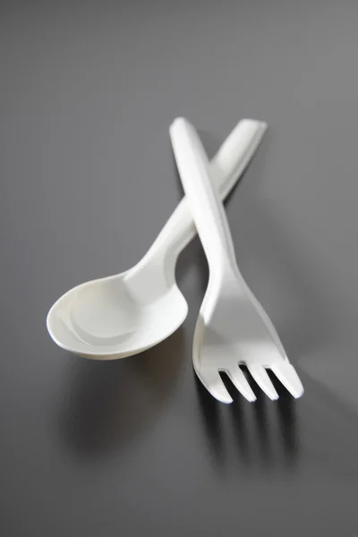 Tenedor y cuchara de plástico —  Fotos de Stock