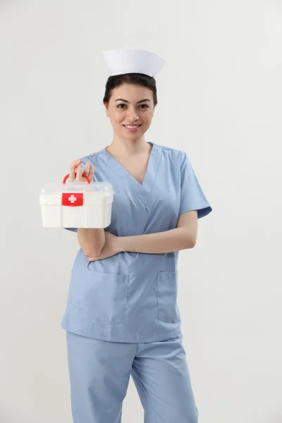Nurse with first aid kit Stock Photo by eskaylim 65067935