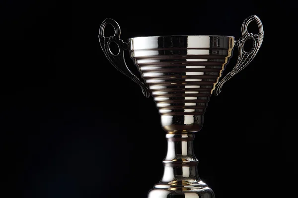 Silver color trophy on the black — Stock Photo, Image