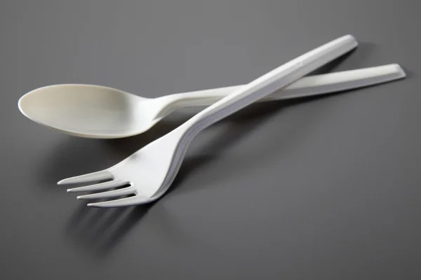 Plastic fork and spoon — Stock Photo, Image