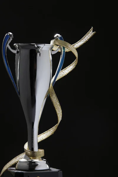 Silver cup with ribbon — Stock Photo, Image