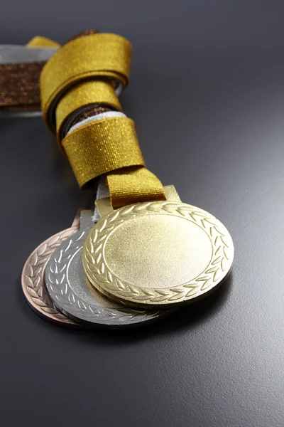 Gouden, zilveren en bronzen medailles — Stockfoto