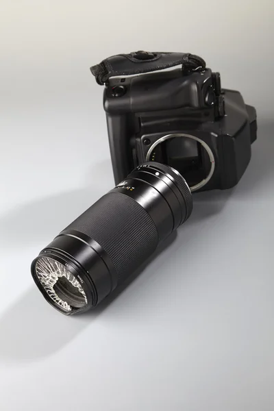 Gebroken camera lens — Stockfoto