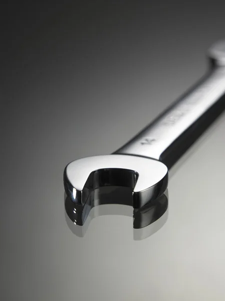 Wrench with reflection — Stock Photo, Image