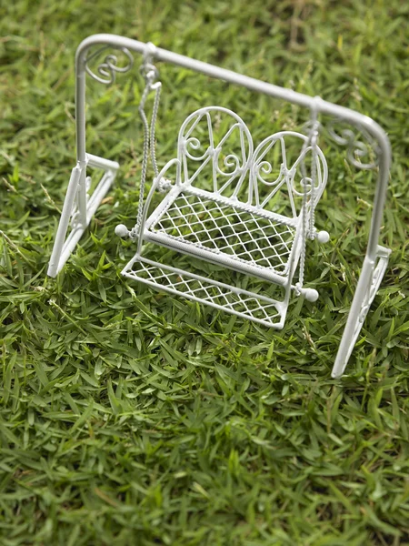 Mini swing on the grass — Stock Photo, Image