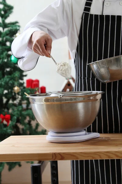Pouring the caster sugar in the mixer — Stock Photo, Image