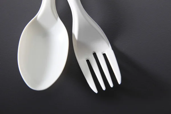Plastic fork and spoon — Stock Photo, Image