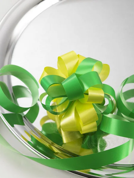 Green ribbon bows — Stock Photo, Image