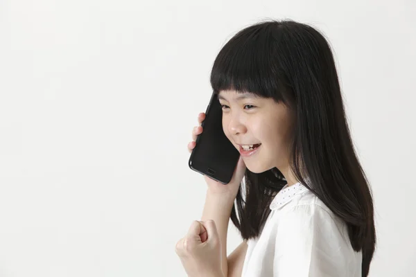 Čínské dívky na telefonu — Stock fotografie