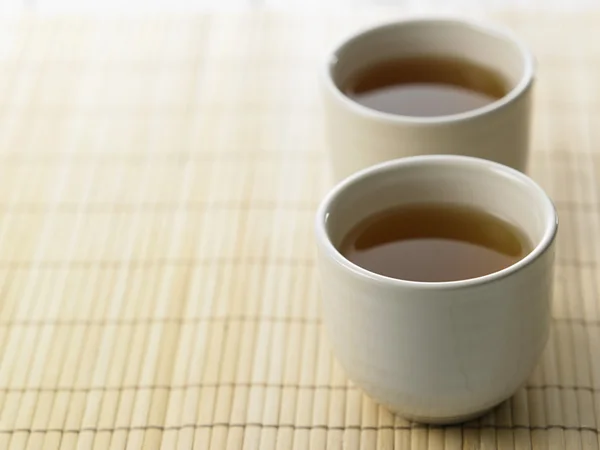 Hot green tea on the table — Stock Photo, Image