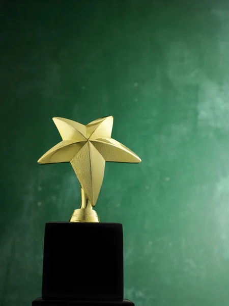 Star shape trophy for winner — Stock Photo, Image