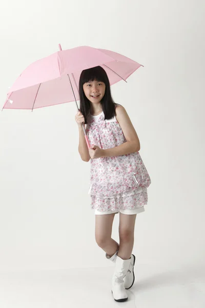 Girl holding umbrella — Stock Photo, Image