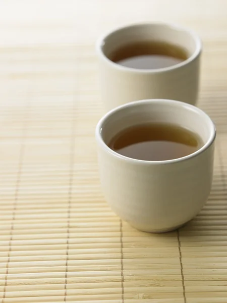 Hot green tea on the table — Stock Photo, Image