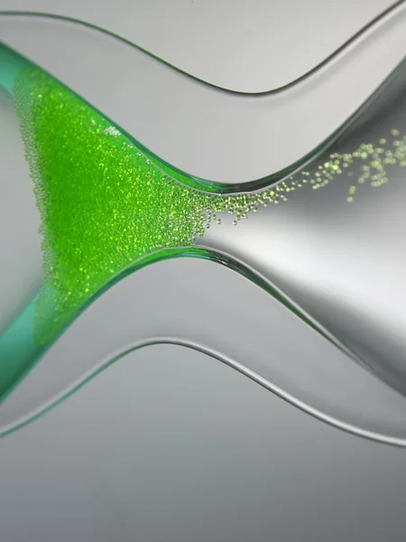 Green liquid type of hour-glass — Stock Photo, Image