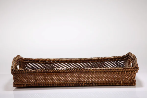 Woven tray on the white background — Stock Photo, Image
