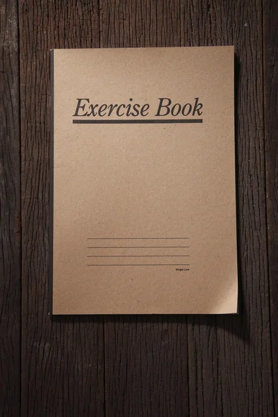 Exercise book on table — Stock Photo, Image